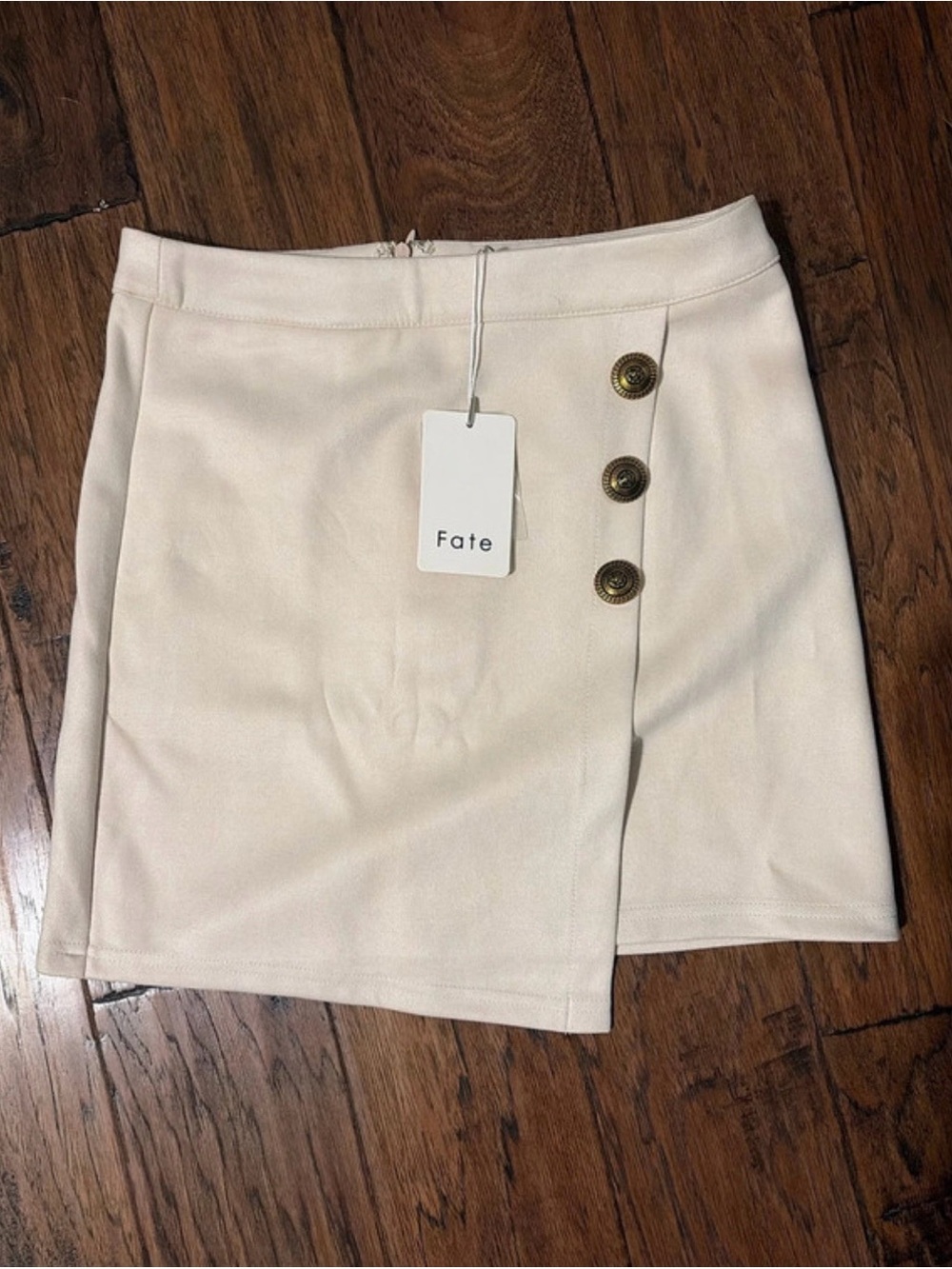 Fate Ivory Asymmetrical Mini Skirt with Button Trim